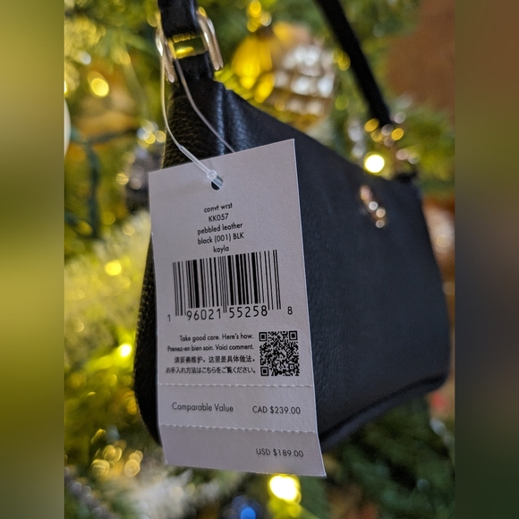 Brand new Kate Spade mini purse with original tags and packaging - Picture 3 of 6